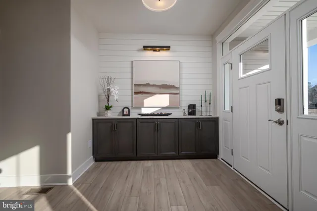 a view of a kitchen from the hallway