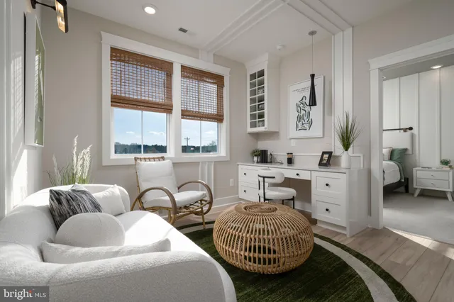 a bedroom with furniture and a window