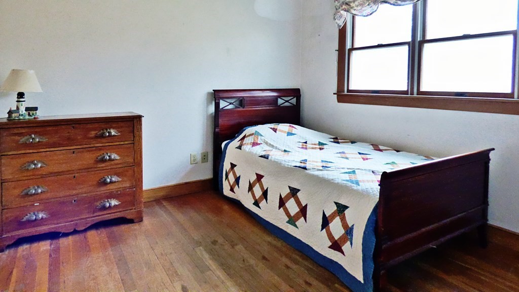 115 Richard Drive Hanover, MA 02339 - Photo 11 of 18 a bedroom with a bed and a window