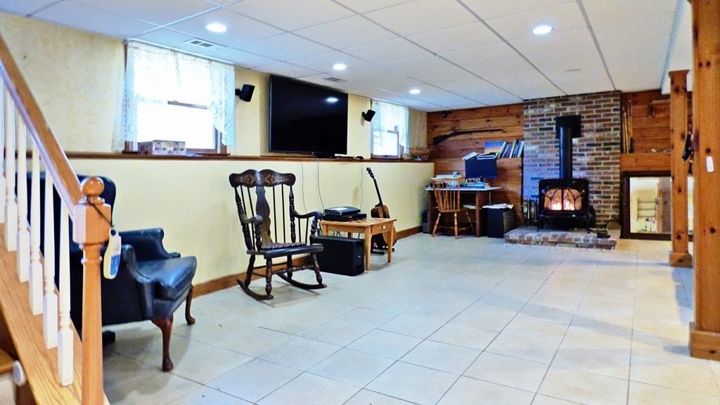 115 Richard Drive Hanover, MA 02339 - Photo 13 of 18 a living room with furniture and a flat screen tv