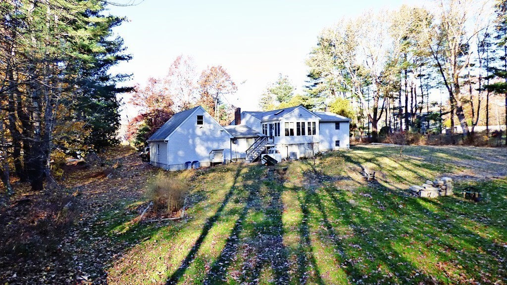 115 Richard Drive Hanover, MA 02339 - Photo 18 of 18 a view of a house with swimming pool and sitting area