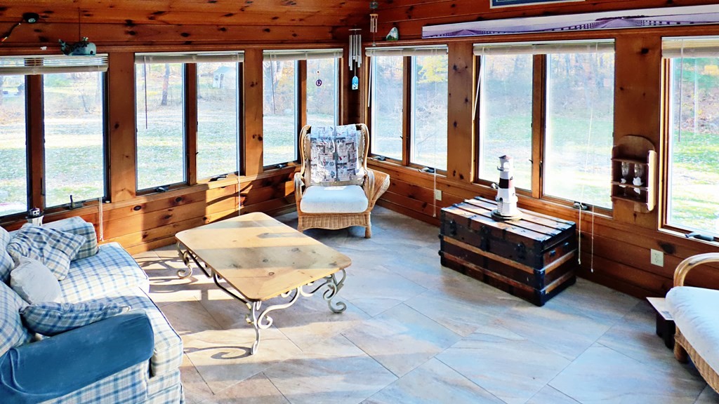 115 Richard Drive Hanover, MA 02339 - Photo 6 of 18 a living room with furniture and large windows