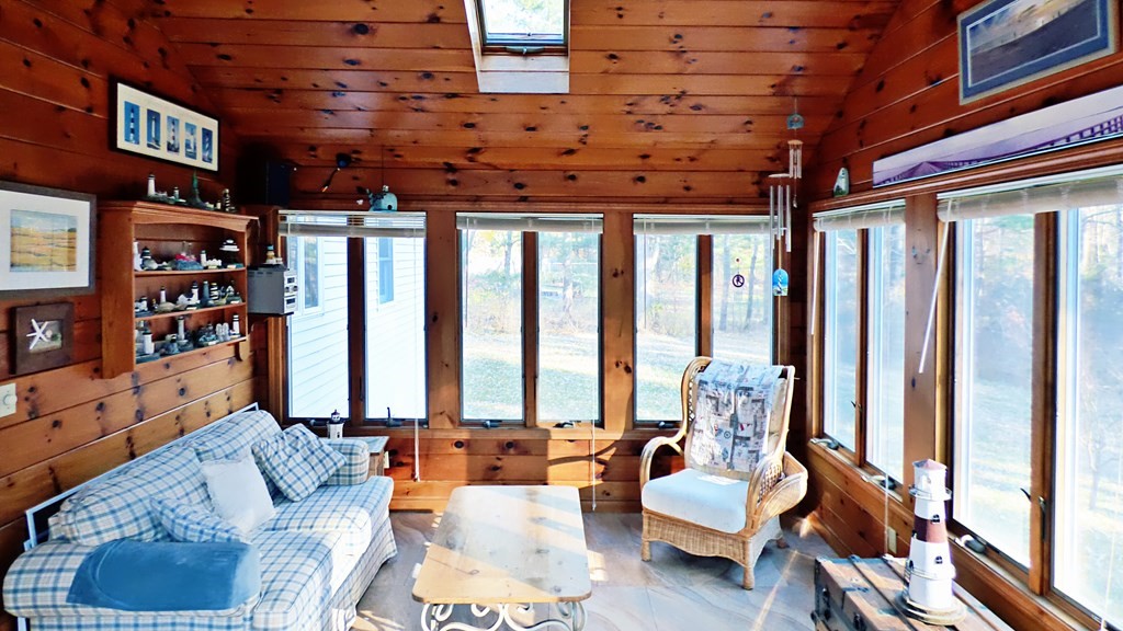 115 Richard Drive Hanover, MA 02339 - Photo 7 of 18 a living room with furniture and large windows
