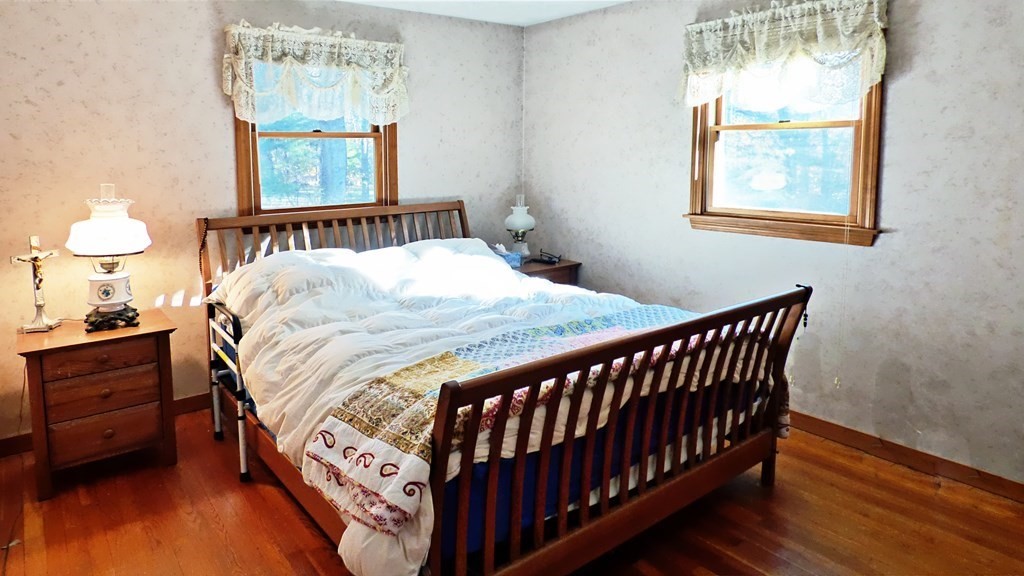 115 Richard Drive Hanover, MA 02339 - Photo 9 of 18 a bedroom with a bed and a window
