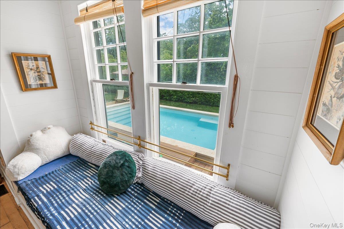19 New Jersey Avenue Bellport, NY 11713 - Photo 11 of 17 a living room with furniture and a window