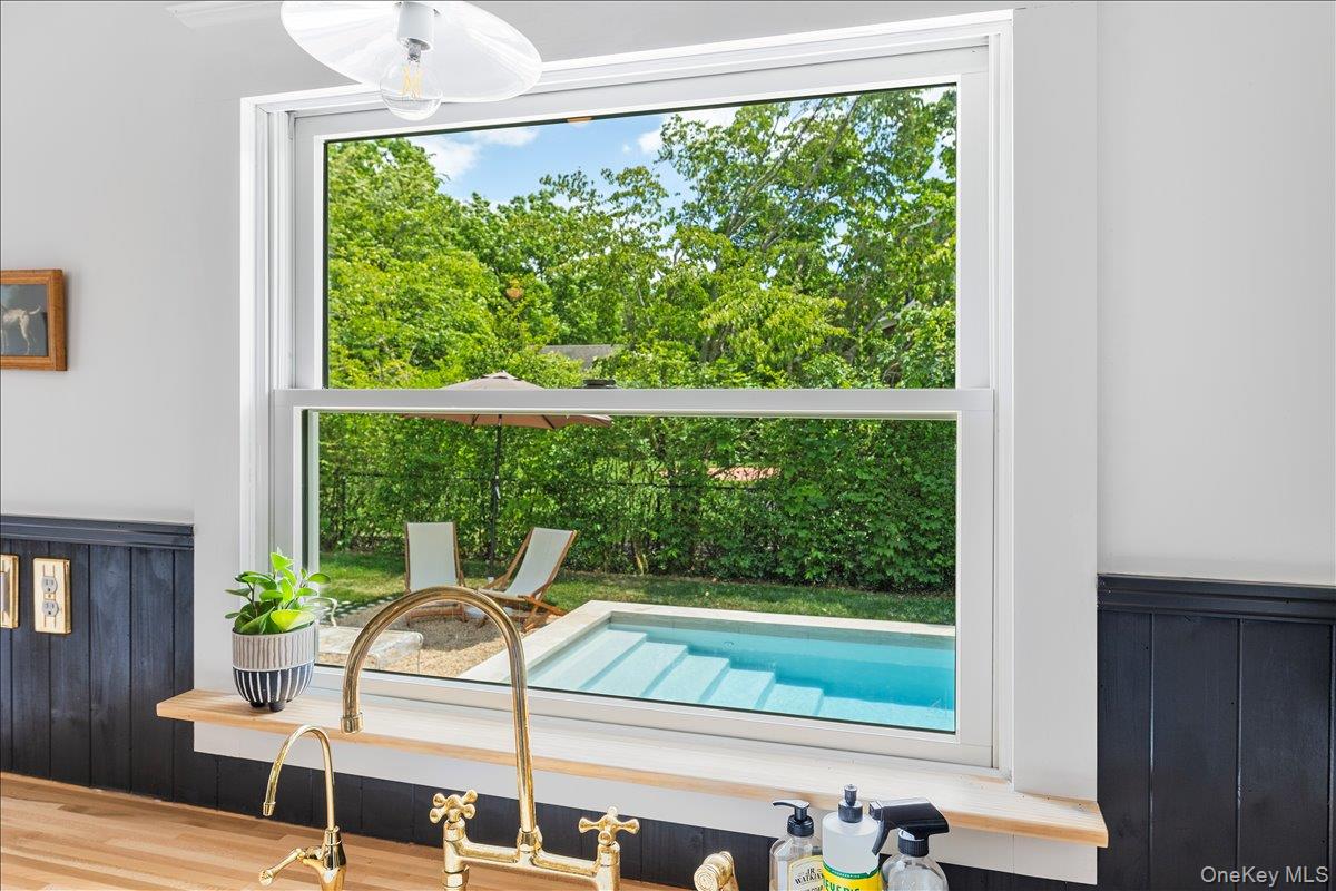 19 New Jersey Avenue Bellport, NY 11713 - Photo 13 of 17 a view of a chairs and table in a patio