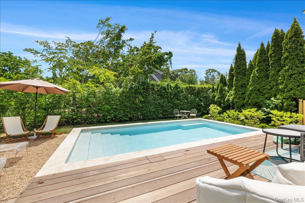 19 New Jersey Avenue Bellport, NY 11713 - Photo 16 of 17 a view of a yard with an outdoor space