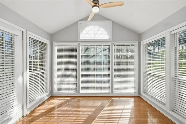 a view of an empty room with a window