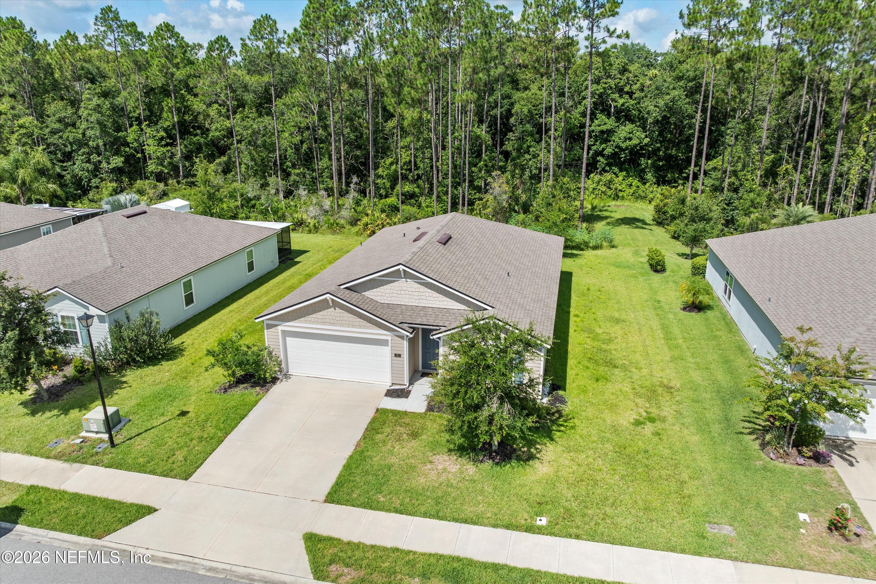 91 Rivertown Road Palm Coast, FL 32137 - Photo 3 of 36 33-Aerial Front