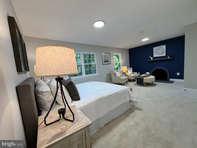 a bed room with a bed furniture and a window