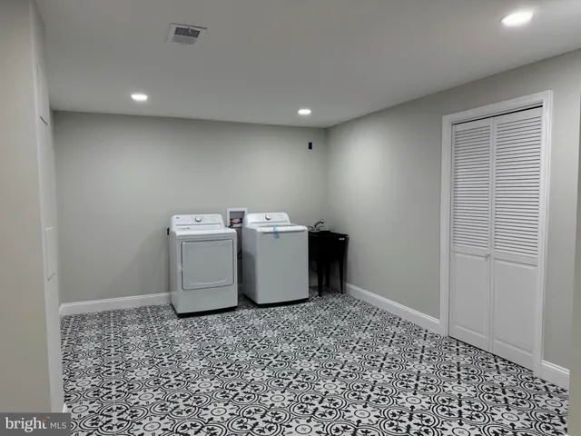 a utility room with a washer and dryer