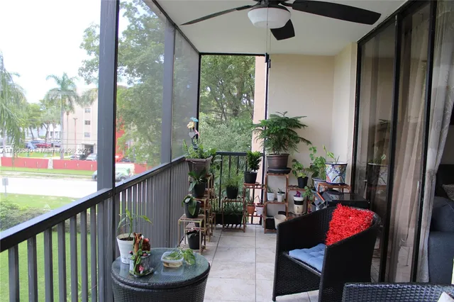 a kitchen with stainless steel appliances granite countertop a refrigerator a stove and a sink