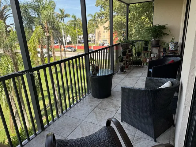 a view of a workspace with furniture