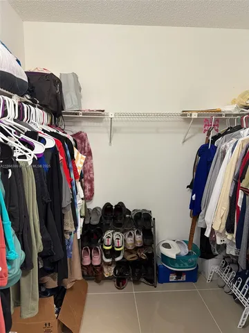 a view of swimming pool with a yard