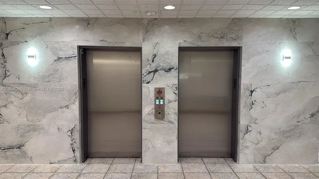 a view of a hallway with wooden shelves