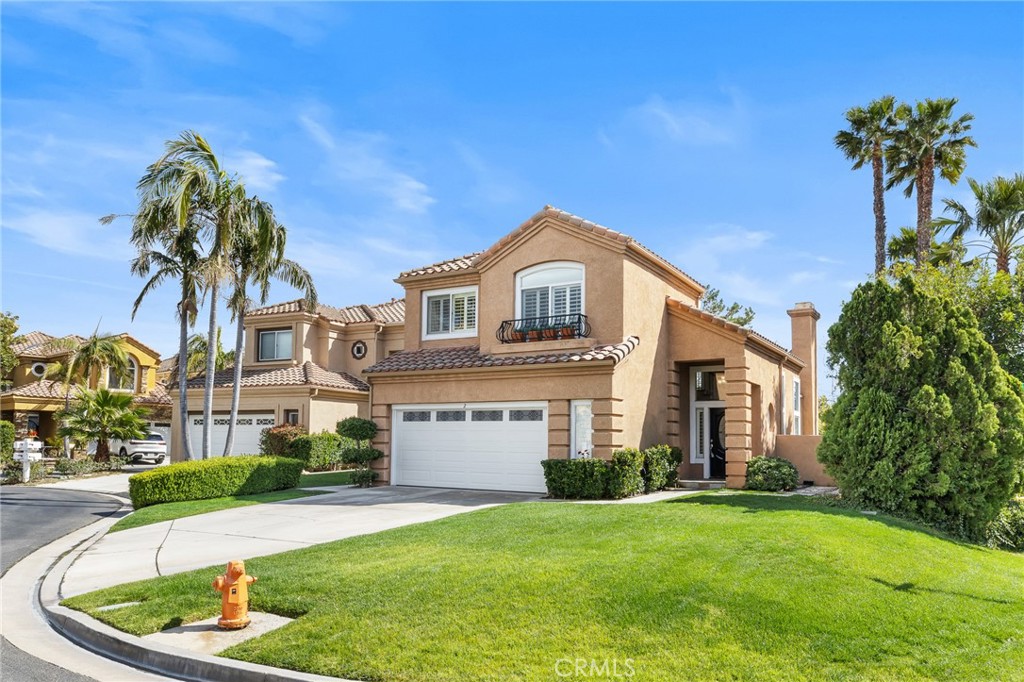 2 Minikahda Trabuco Canyon, CA 92679 - Photo 3 of 41 a front view of a house with a garden and yard