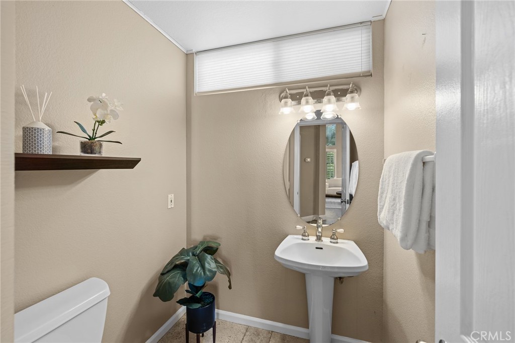 2 Minikahda Trabuco Canyon, CA 92679 - Photo 8 of 41 a bathroom with a sink and a mirror