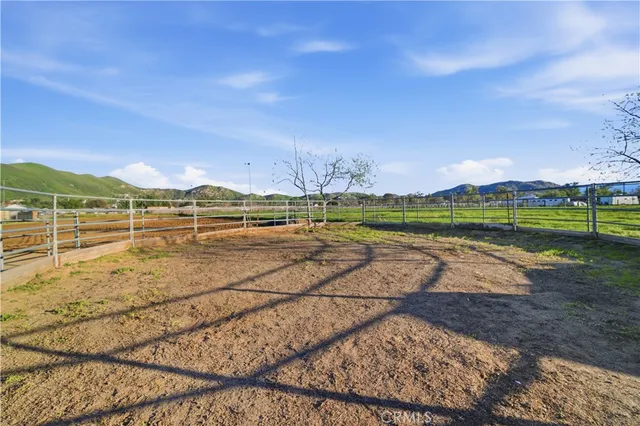 a view of an outdoor space and tennis court