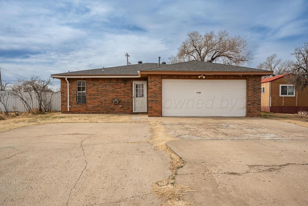 2106 South Cleveland Street Amarillo, TX 79103 - Photo 1 of 26 a view of a house with a outdoor space