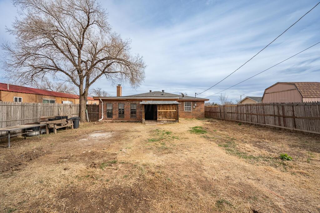 2106 South Cleveland Street Amarillo, TX 79103 - Photo 24 of 26 a view of a yard in front of a house