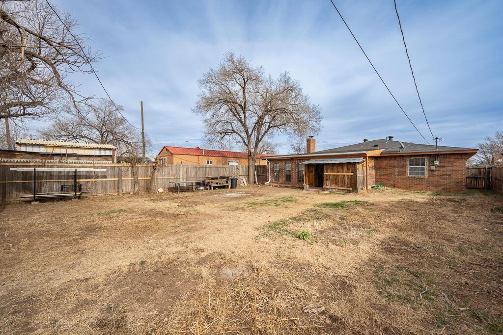 2106 South Cleveland Street Amarillo, TX 79103 - Photo 25 of 26 a front view of a house with a yard
