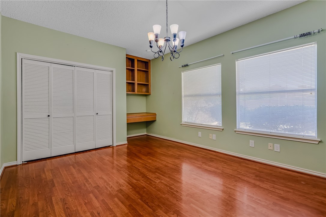 5917 Harvest Hill Road Corpus Christi, TX 78414 - Photo 11 of 40 a view of a room with window and wooden floor