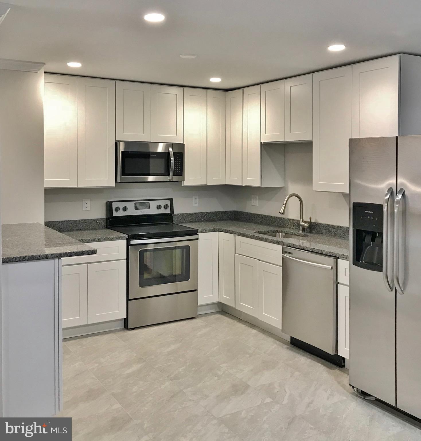 909 Waugh Chapel Road Gambrills, MD 21054 - Photo 2 of 20 Beautiful open Kitchen with breakfast bar