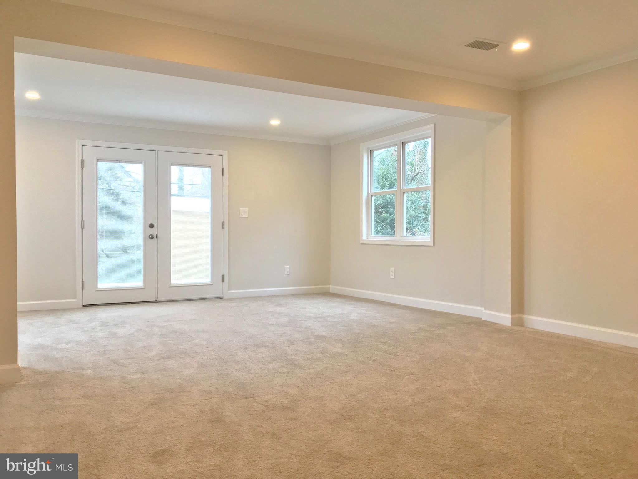909 Waugh Chapel Road Gambrills, MD 21054 - Photo 14 of 20 Large Basement Media Room, plenty of natural light