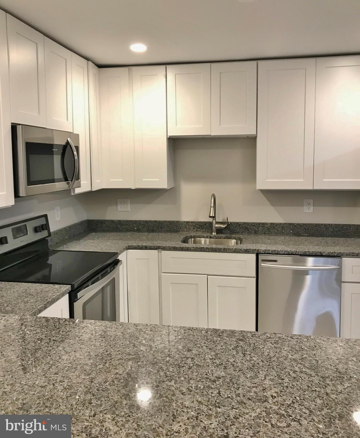 909 Waugh Chapel Road Gambrills, MD 21054 - Photo 3 of 20 Custom Kitchen with luxury cabinets and granite