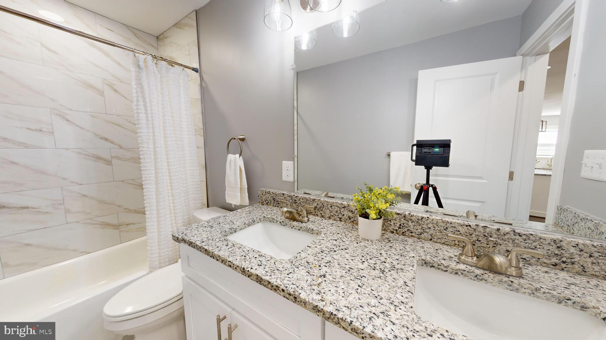 173 Dale Road Pasadena, MD 21122 - Photo 14 of 23 All New Full Bath w/ Double Sinks and Granite