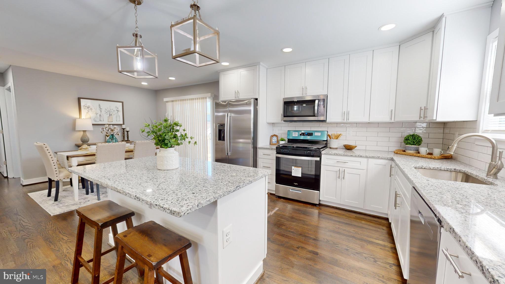 173 Dale Road Pasadena, MD 21122 - Photo 10 of 23 All New Kitchen with Custom Granite and Island