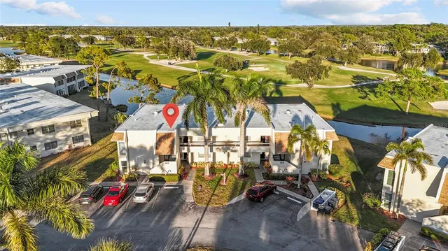 a view of an chairs and table on the wooden floor