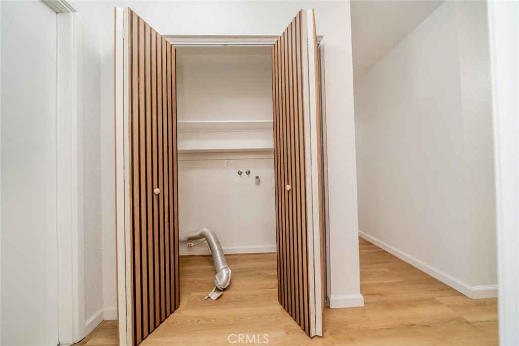 14721 Weeping Willow Lane Fontana, CA 92337 - Photo 12 of 25 a view of a bedroom from a hallway