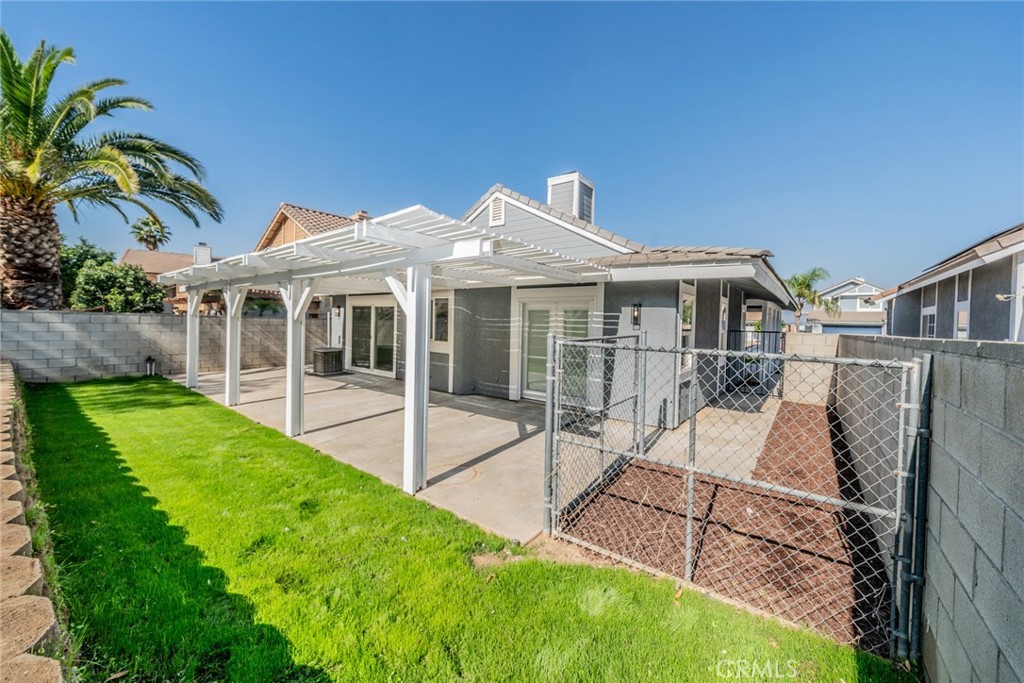 14721 Weeping Willow Lane Fontana, CA 92337 - Photo 20 of 25 a view of a house with a backyard