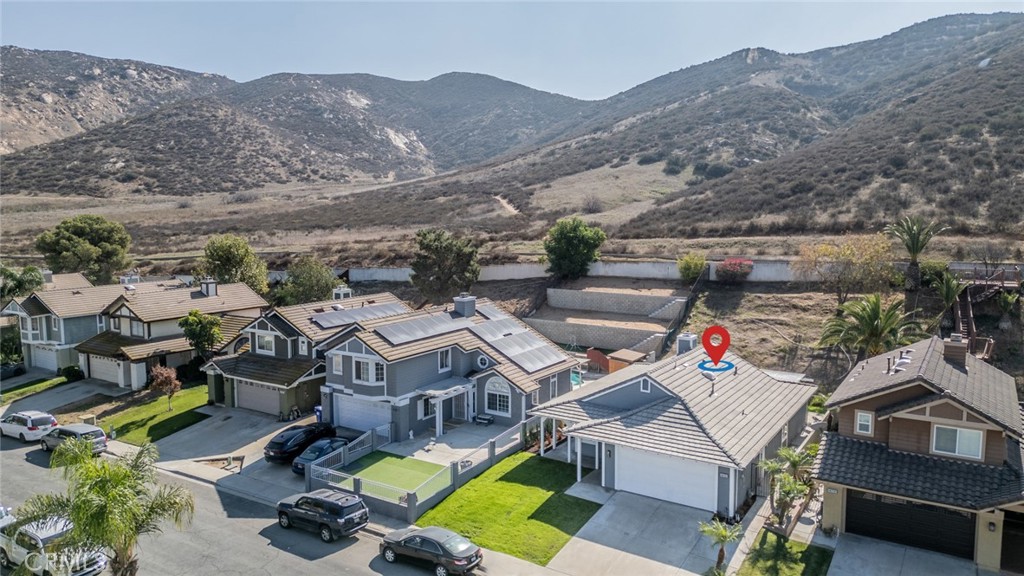 14721 Weeping Willow Lane Fontana, CA 92337 - Photo 23 of 25 an aerial view of a houses with a mountain