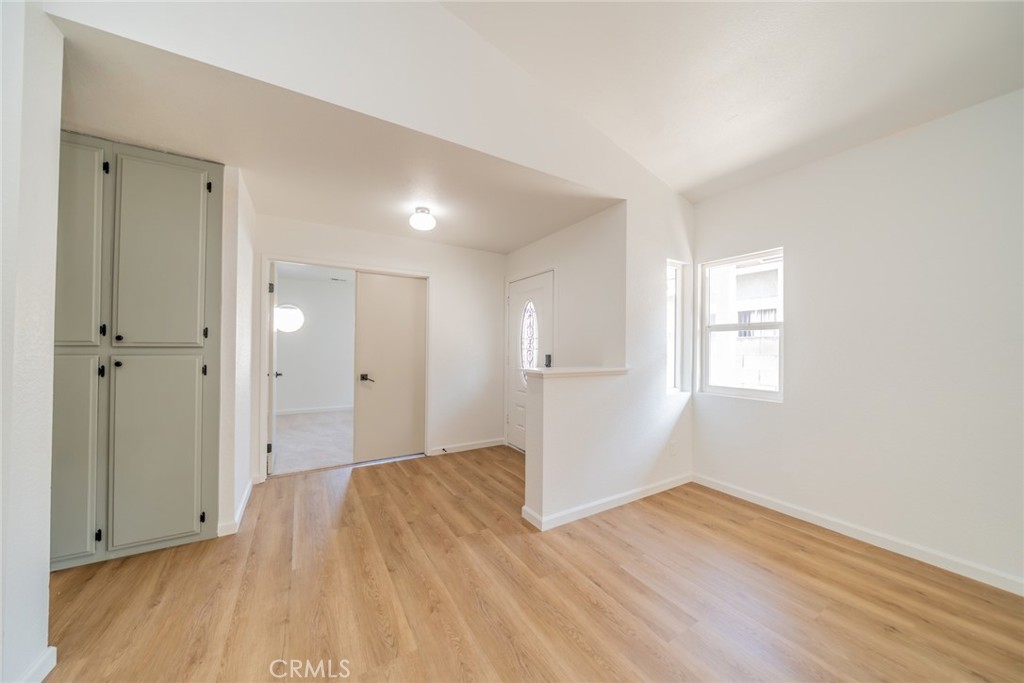 14721 Weeping Willow Lane Fontana, CA 92337 - Photo 10 of 25 wooden floor in an empty room with a window