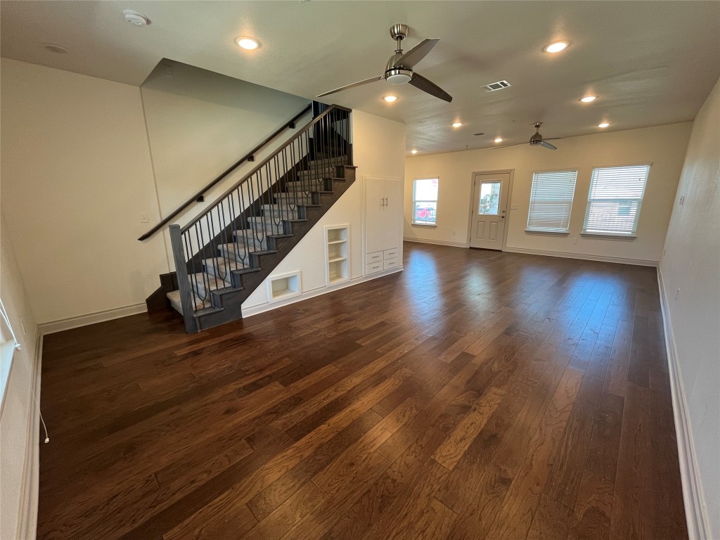2105 Tiger Trail, Unit 502 Round Rock, TX 78664 - Photo 2 of 16 a view of entryway and hall with wooden floor