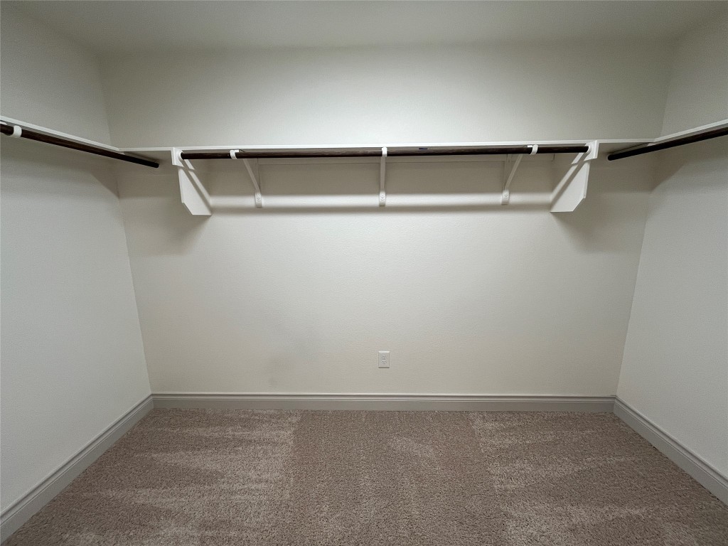 2105 Tiger Trail, Unit 502 Round Rock, TX 78664 - Photo 6 of 16 a view of an empty walk in closet