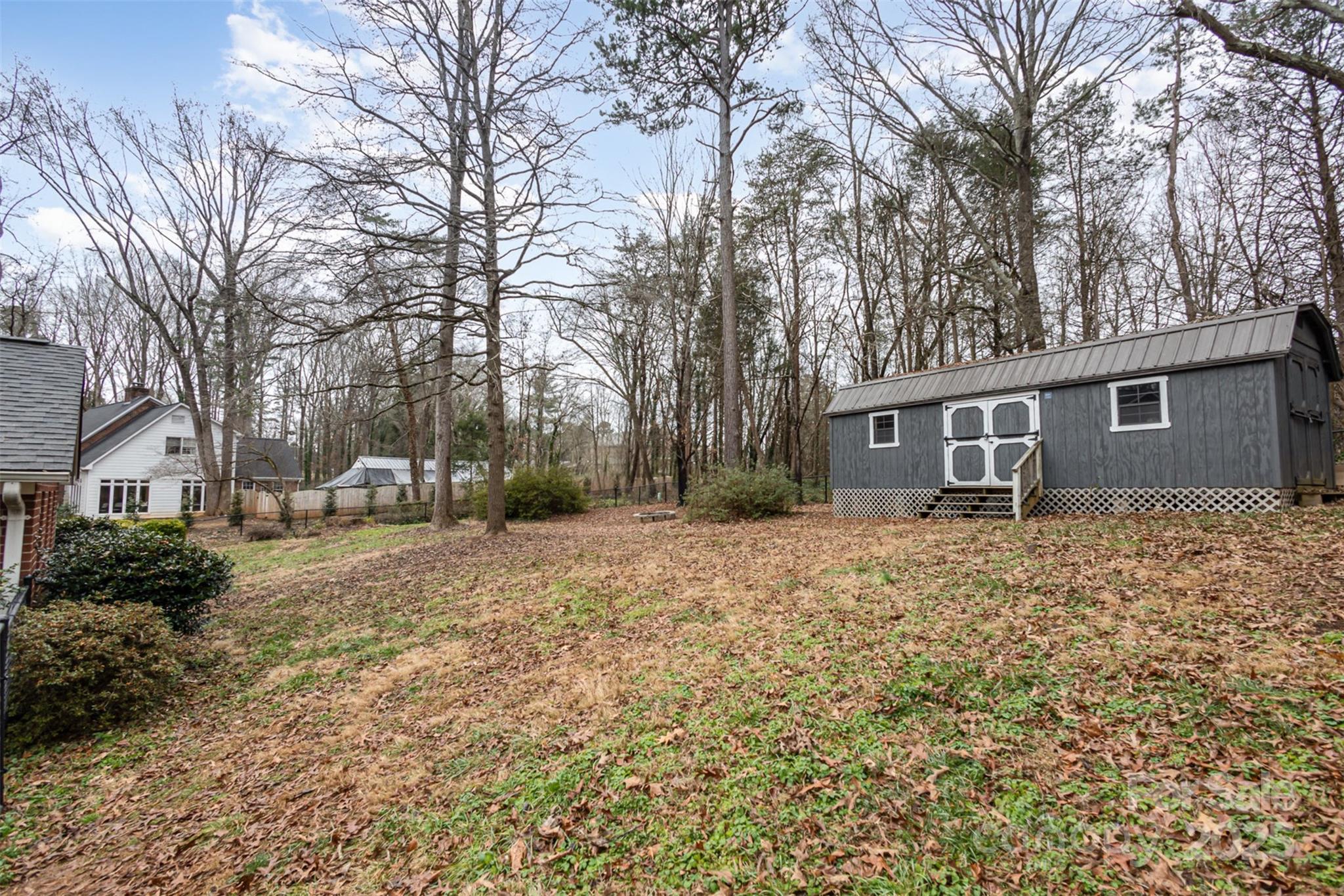 330 Regency Road Salisbury, NC 28147 - Photo 26 of 27 a front view of a house with a yard and garage
