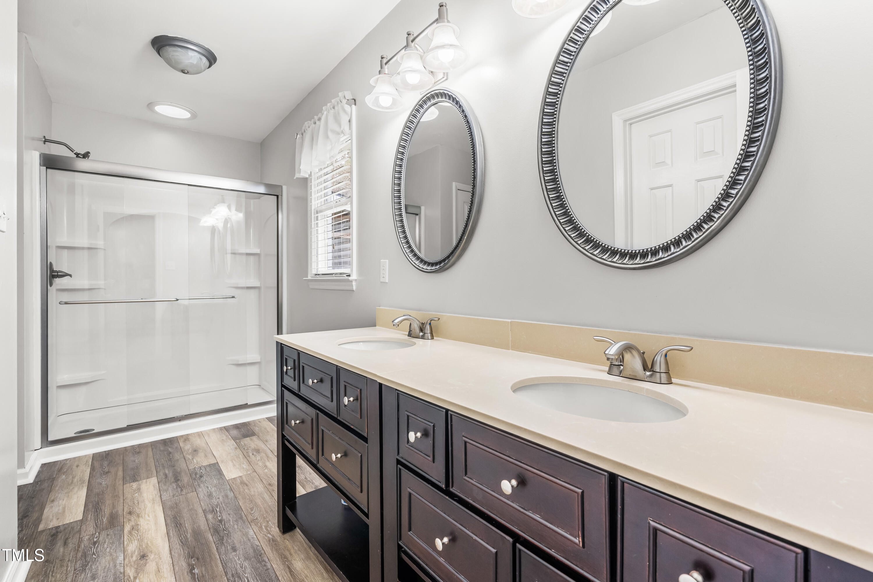5216 Passenger Place Raleigh, NC 27603 - Photo 20 of 33 Updated vanity in bath has dual sinks and a walk in shower!