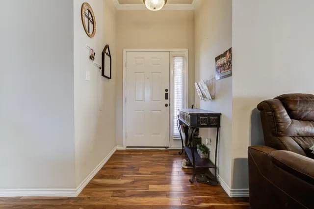 a view of livingroom with furniture and wooden floor