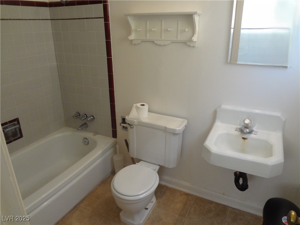 619 C, Unit 1 Boulder City, NV 89005 - Photo 8 of 8 Full bath with baseboards, tile patterned flooring