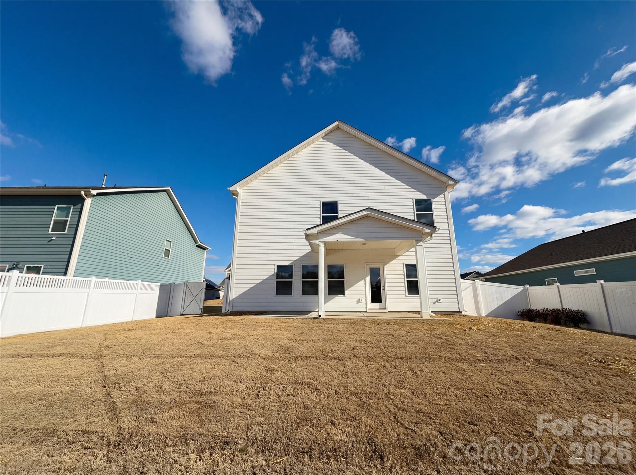 617 Ardsley Drive Locust, NC 28097 - Photo 5 of 23 a front view of a house with a yard