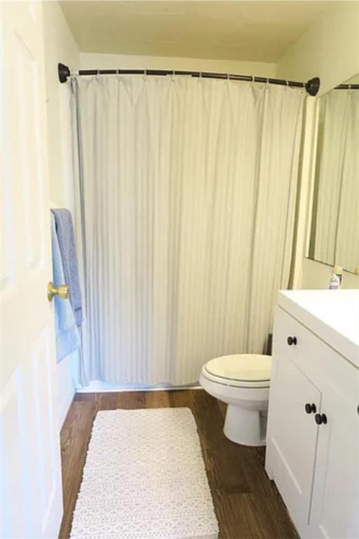 4415 Southwest 34th Street, Unit 308 Gainesville, FL 32608 - Photo 9 of 17 a bathroom with a sink a toilet and shower