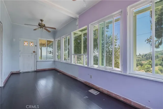 a kitchen with stainless steel appliances granite countertop a refrigerator a stove and a sink