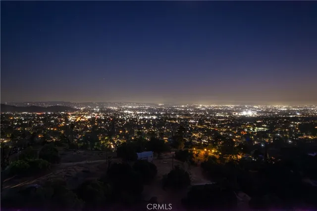 a view of city and green space