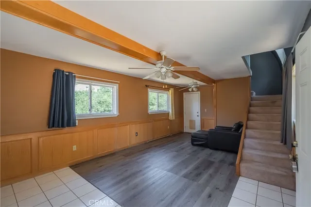 a view of a backyard of the house