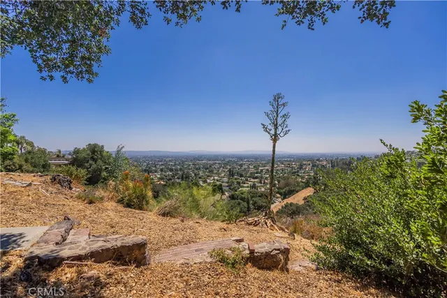 a view of a backyard of a house