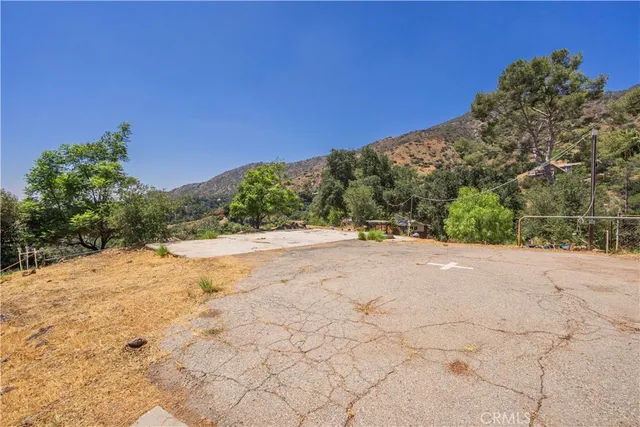 a view of a backyard of a house