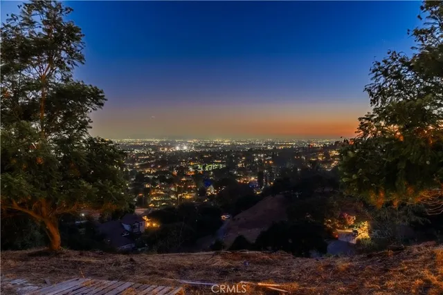 a view of a city with mountain